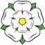 A stylised image of the white rose, symbol of the county of Yorkshire